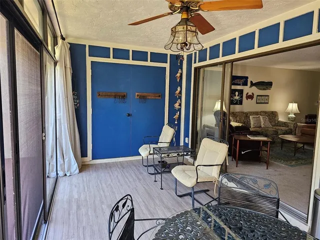 a view of a livingroom with furniture and a couch