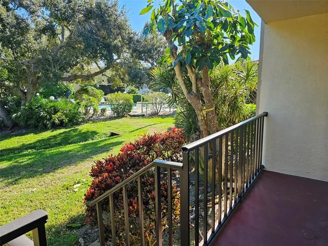 a view of a porch with a yard