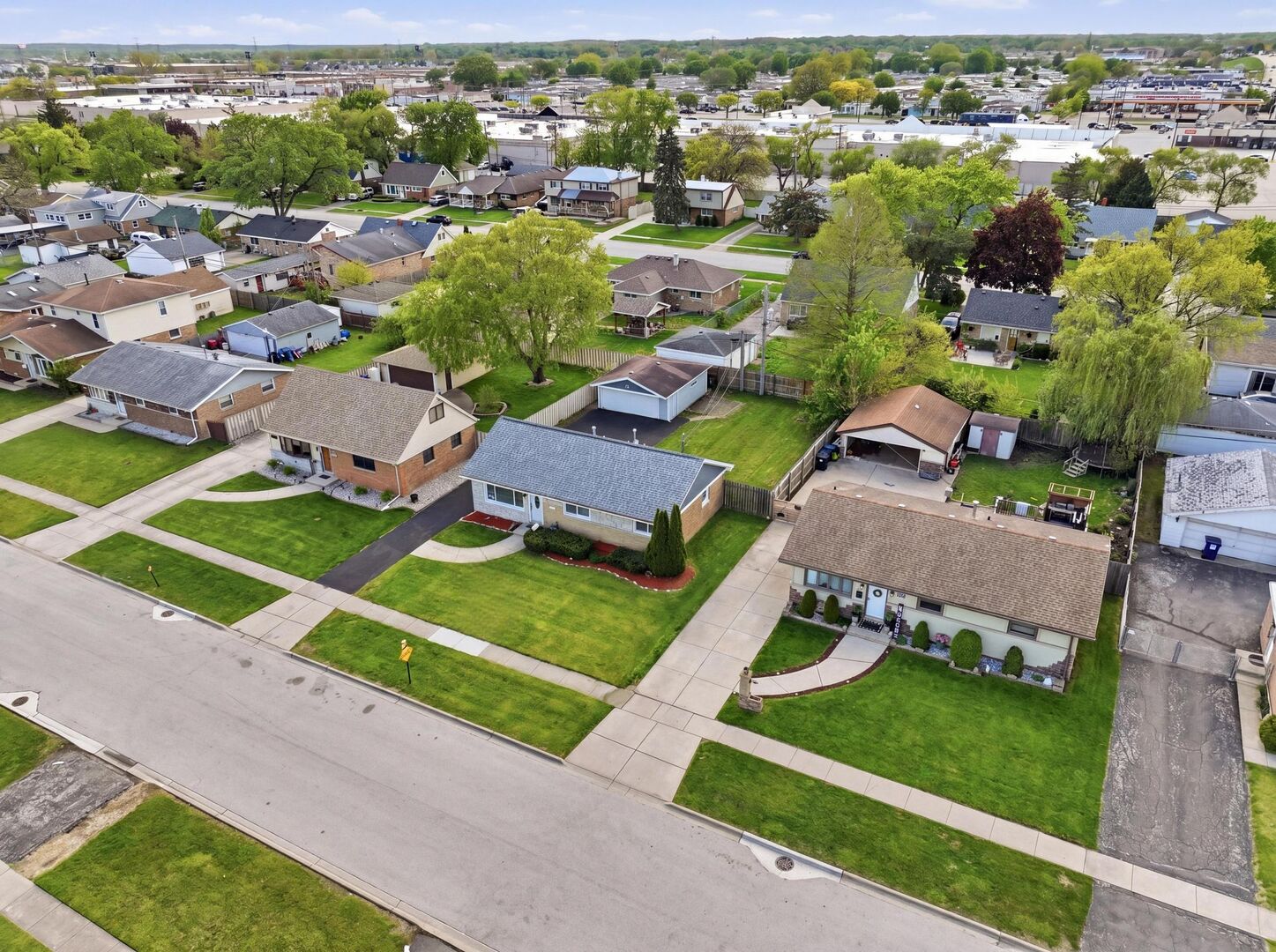 8718 Cranbrook Lane Bridgeview, IL 60455 - Photo 18 of 24 an aerial view of a house with a garden