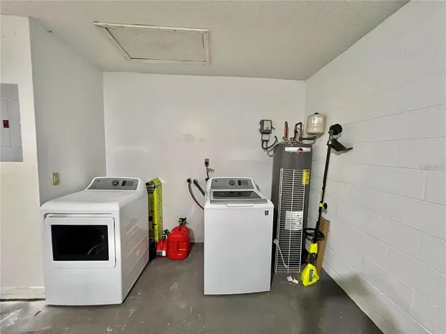 a utility room with dryer and washer