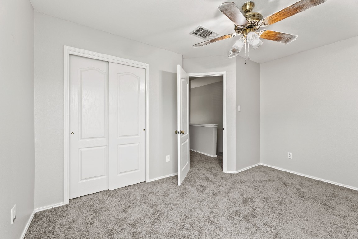1308 Water Spaniel Way Round Rock, TX 78664 - Photo 20 of 25 an empty room with a ceiling fan