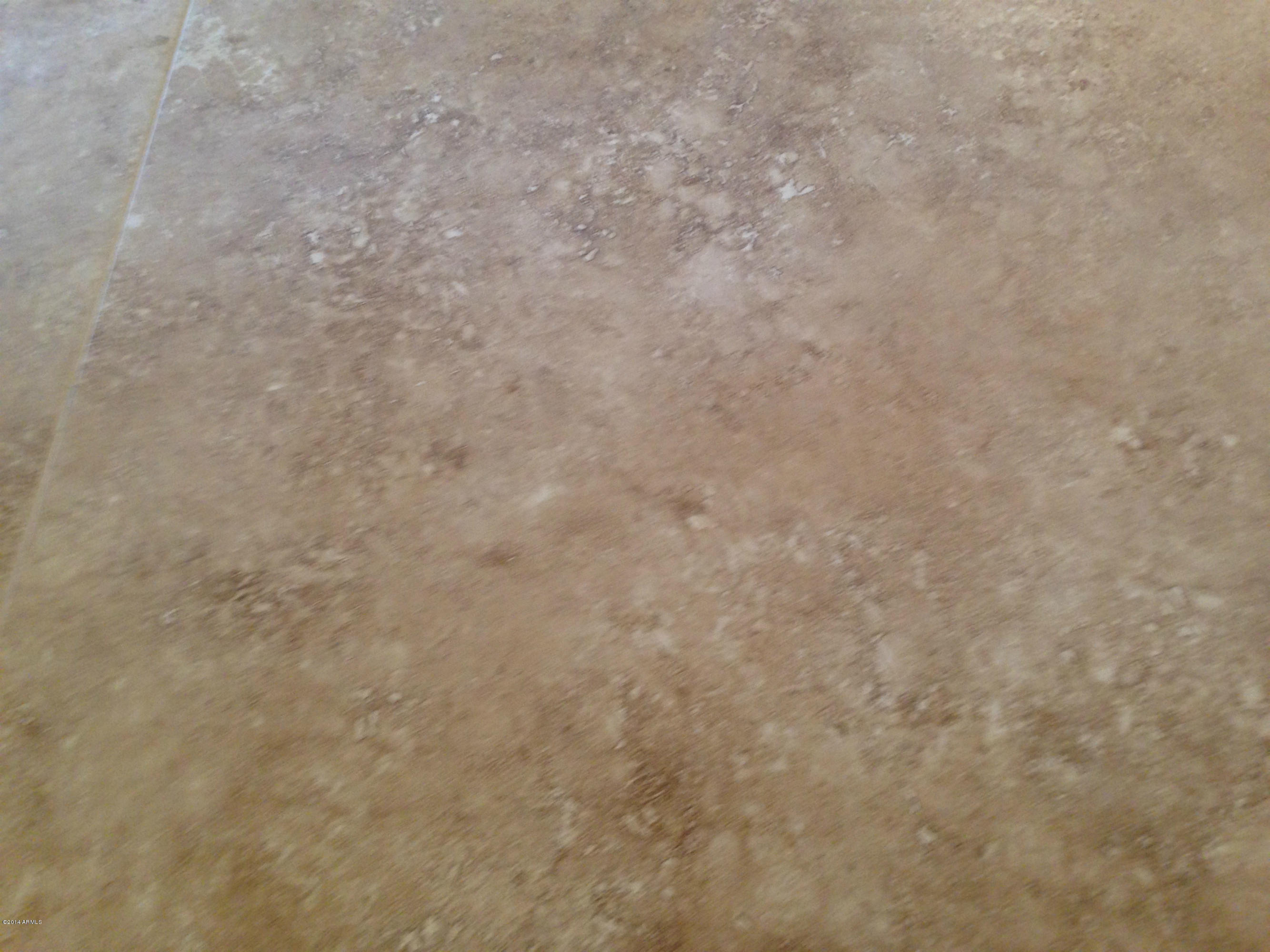 5740 Covina Road Mesa, AZ 85205 - Photo 16 of 19 a close up of a white marble wall