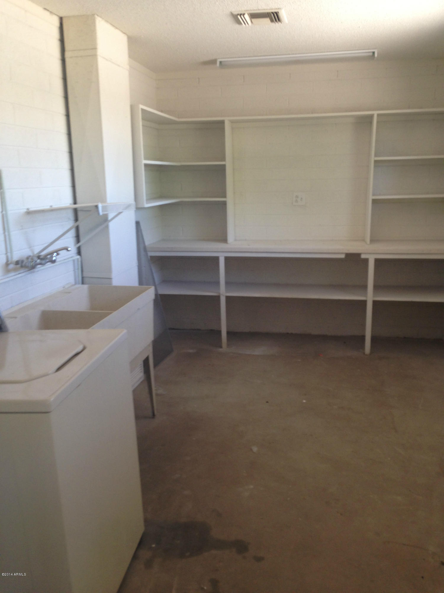 5740 Covina Road Mesa, AZ 85205 - Photo 19 of 19 a view of storage and utility room with washer and dryer