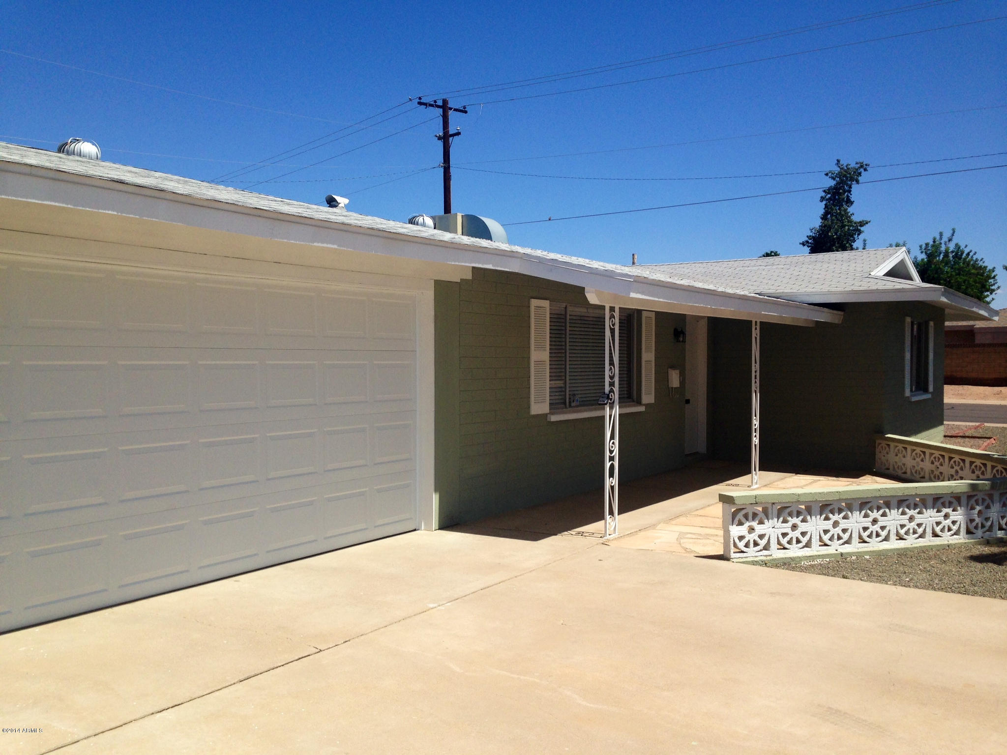 5740 Covina Road Mesa, AZ 85205 - Photo 3 of 19 a front view of a house