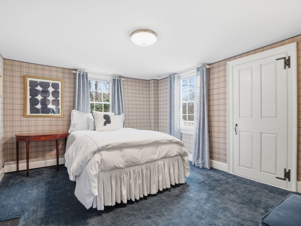 49 Salem Street Andover, MA 01810 - Photo 25 of 39 a bed sitting in a spacious bedroom next to a window