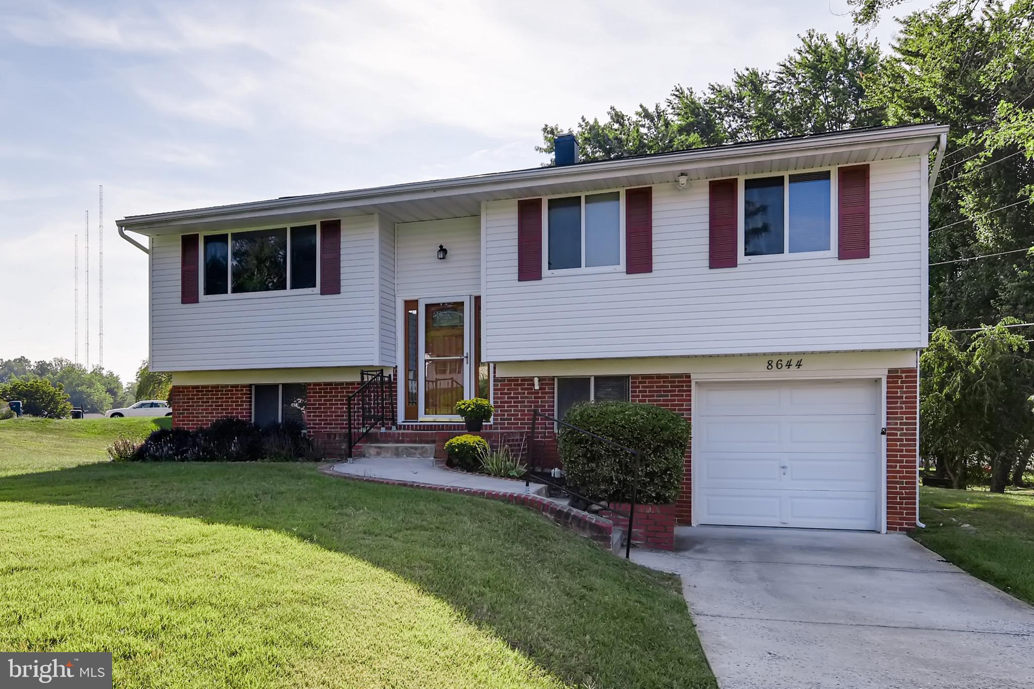 8644 Lucerne Road Randallstown, MD 21133 - Photo 26 of 32 Exterior Front | Driveway Parking Pad