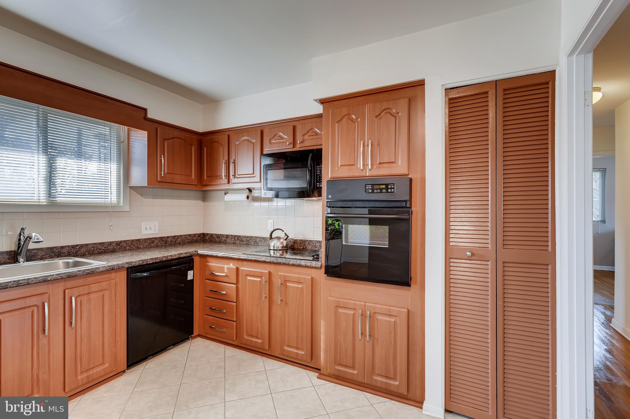8644 Lucerne Road Randallstown, MD 21133 - Photo 6 of 32 Spacious Eat-in Kitchen | Cooktop Electric Stove