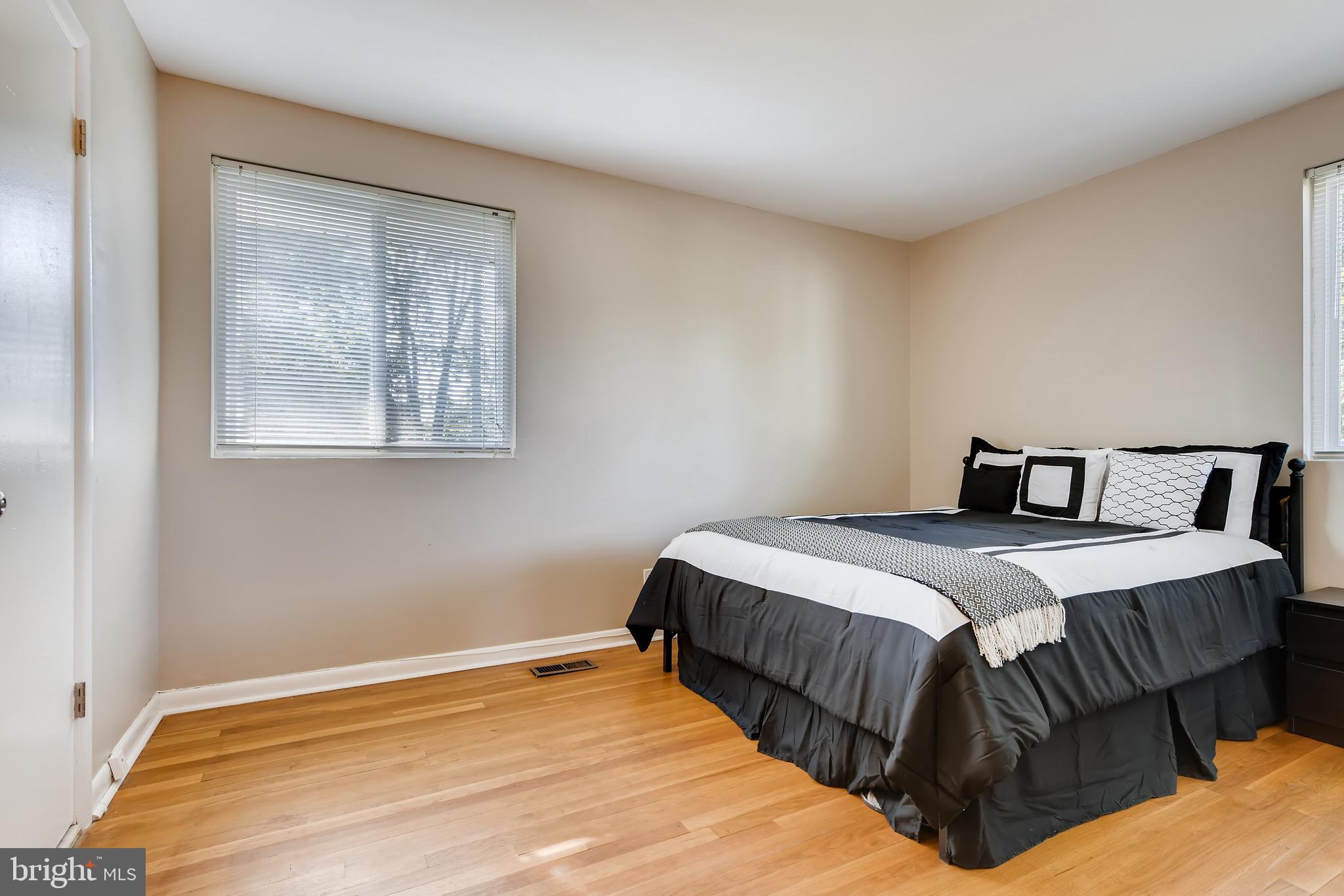 8644 Lucerne Road Randallstown, MD 21133 - Photo 10 of 32 Owner's Bedroom | Original Hardwood Floors