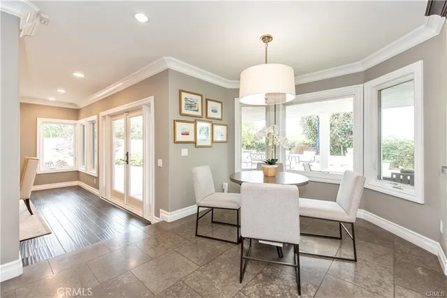 a bathroom with a sink shower and a mirror