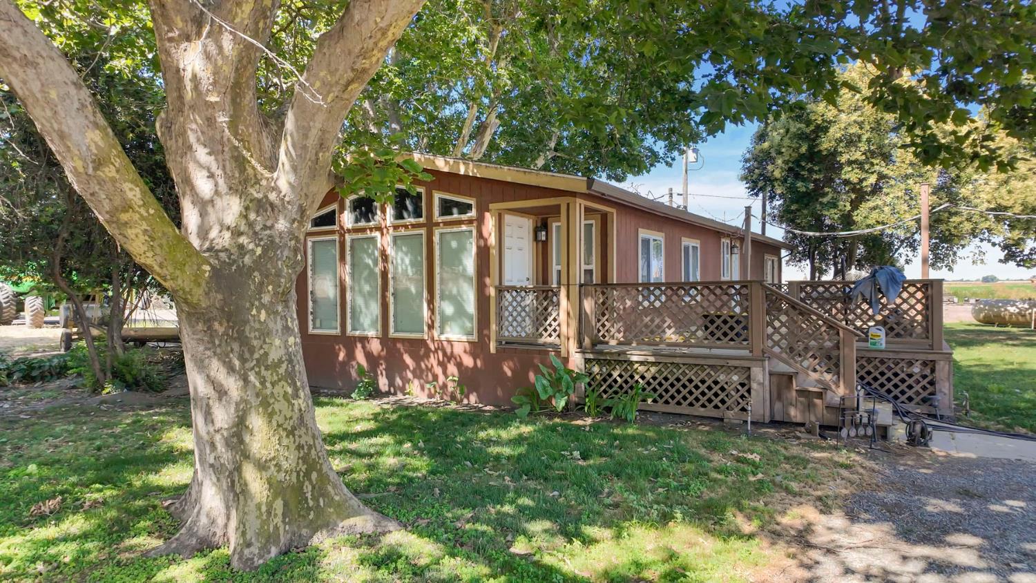 19701 Tyler Island Road Walnut Grove, CA 95690 - Photo 51 of 53 a front view of a house with garden