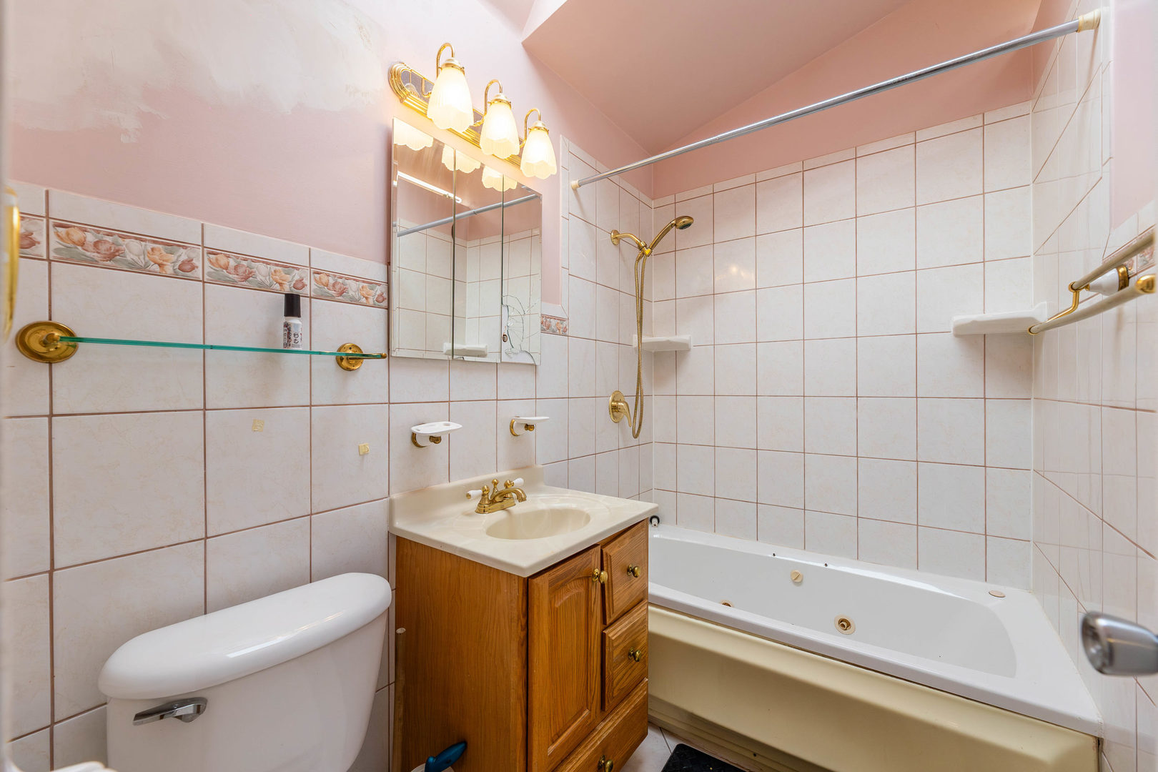 212 Berry Street Park Forest, IL 60466 - Photo 6 of 10 a bathroom with a sink toilet and shower