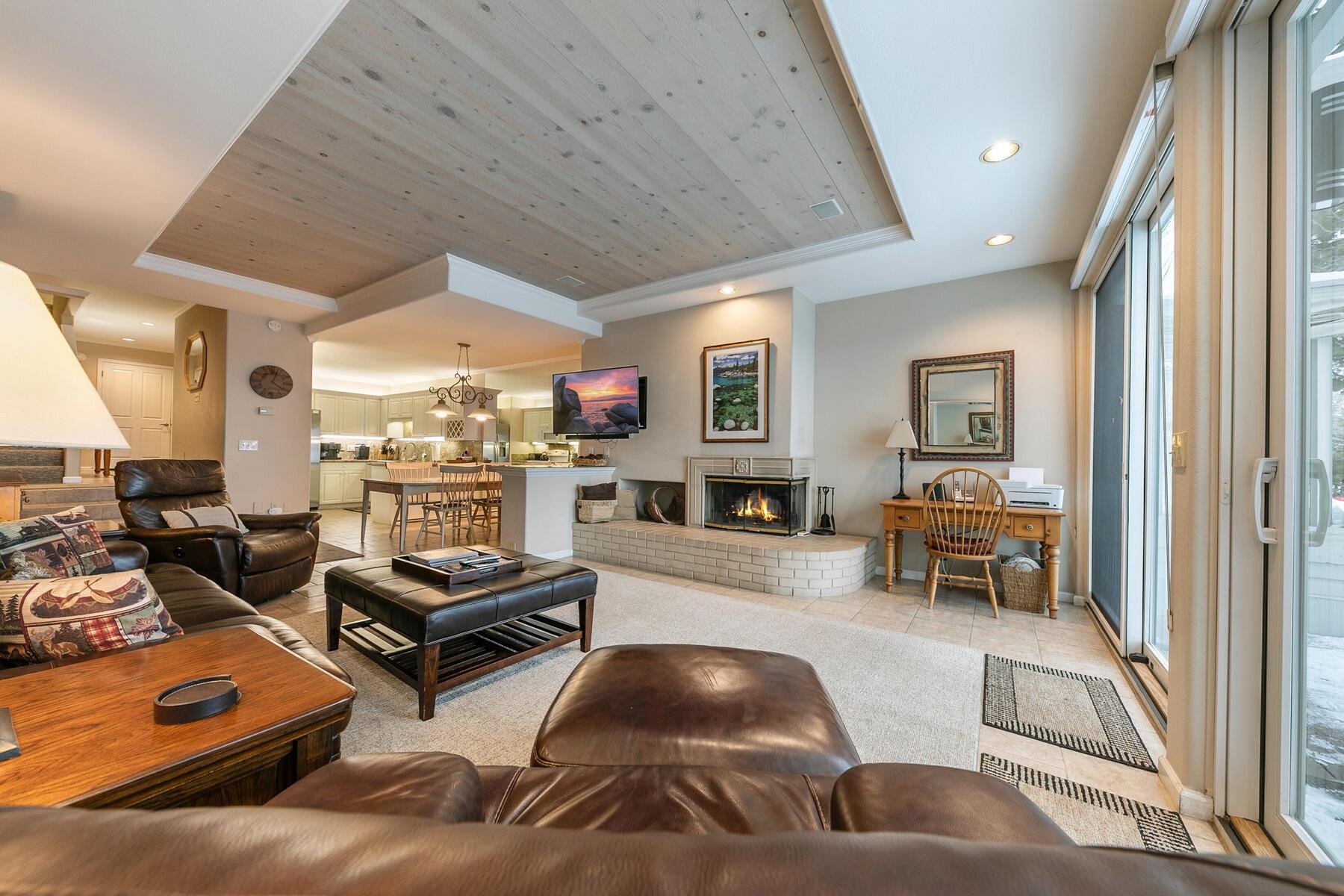 8000 North Lake Boulevard, Unit 5 Kings Beach, CA 96143 - Photo 12 of 28 a living room with furniture and a table