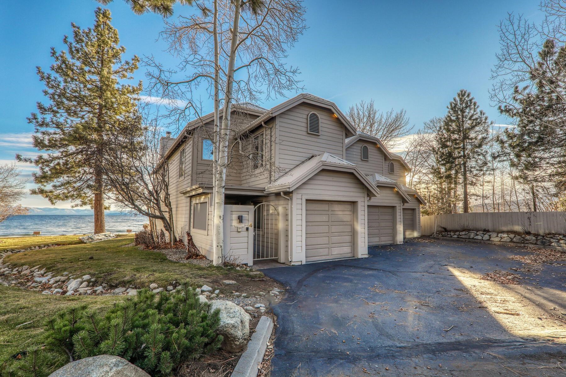 8000 North Lake Boulevard, Unit 5 Kings Beach, CA 96143 - Photo 3 of 28 a front view of a house with a yard
