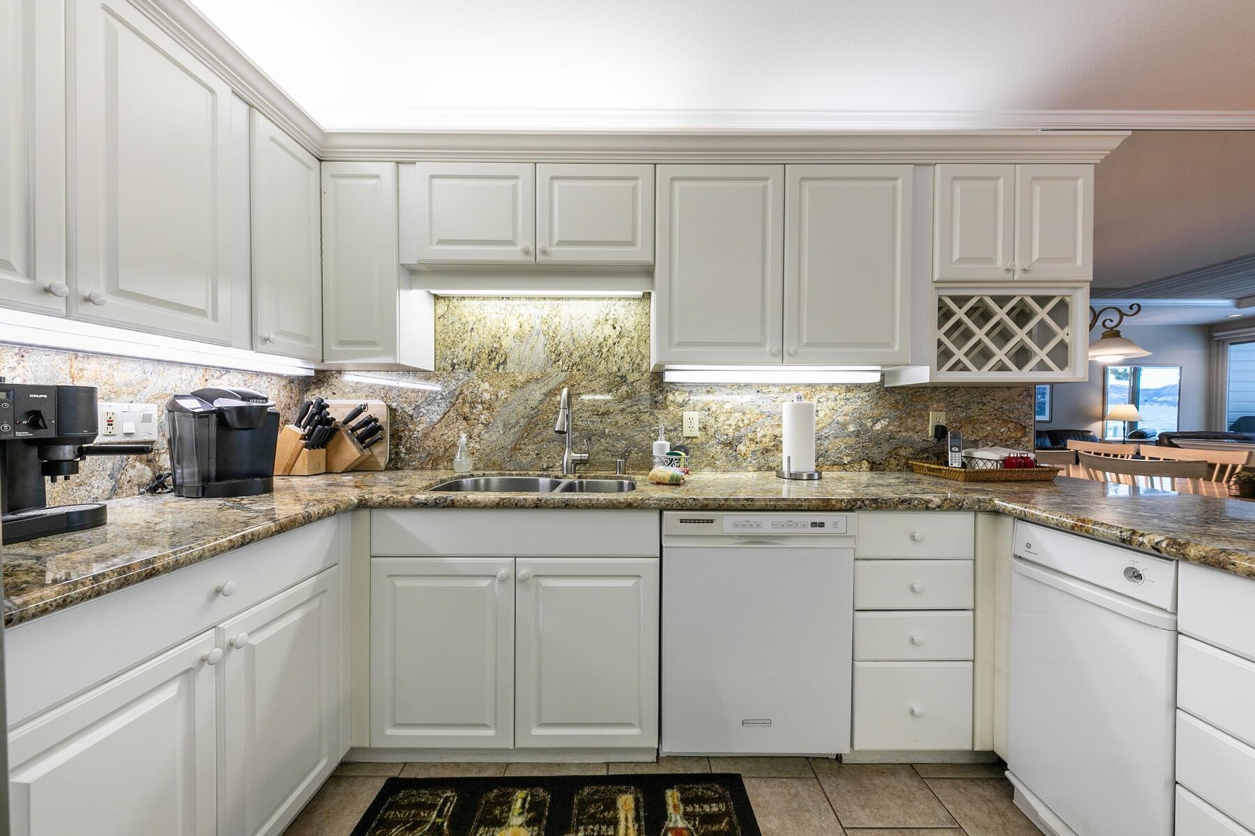 8000 North Lake Boulevard, Unit 5 Kings Beach, CA 96143 - Photo 9 of 28 a kitchen with cabinets appliances a sink and a window