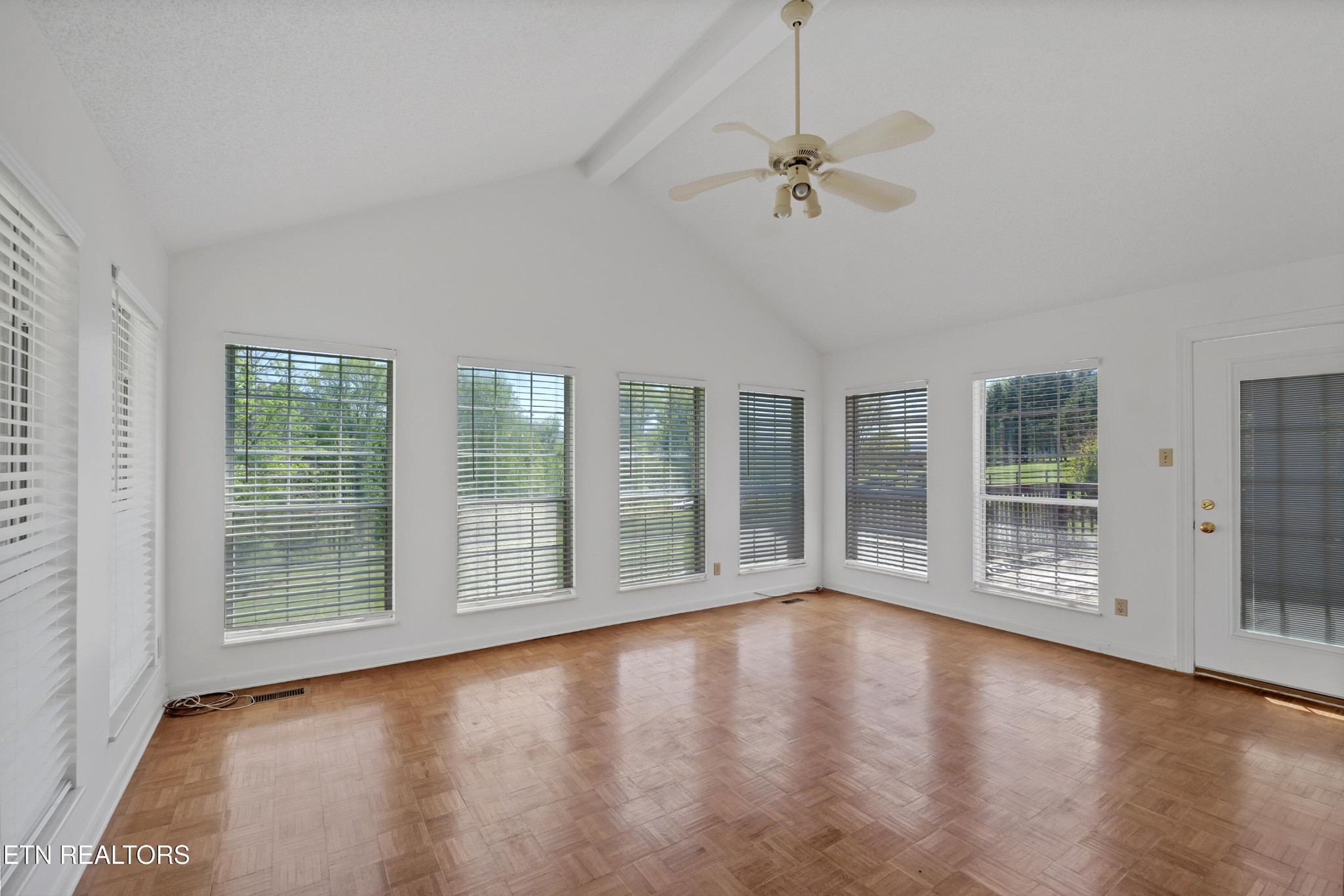 2036 Little Best Road Maryville, TN 37803 - Photo 17 of 54 a view of an empty room with wooden floor and a window