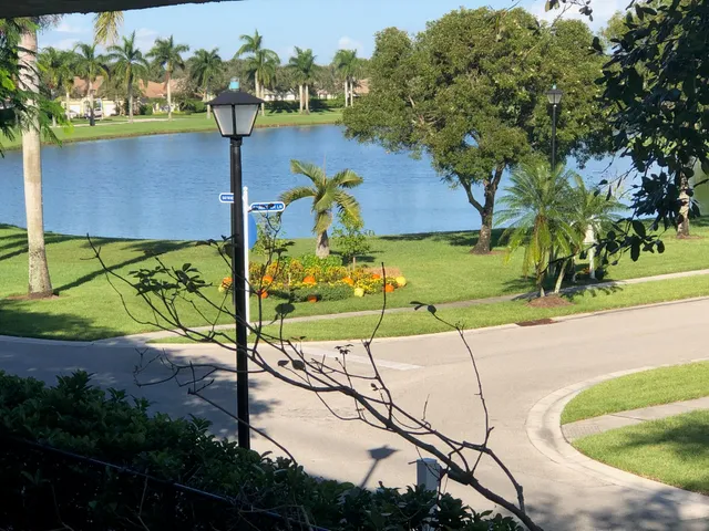 an aerial view of a house with a swimming pool