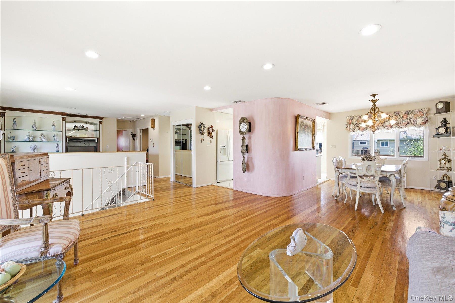 3284 Shore Road Oceanside, NY 11572 - Photo 6 of 27 a living room with furniture and a table