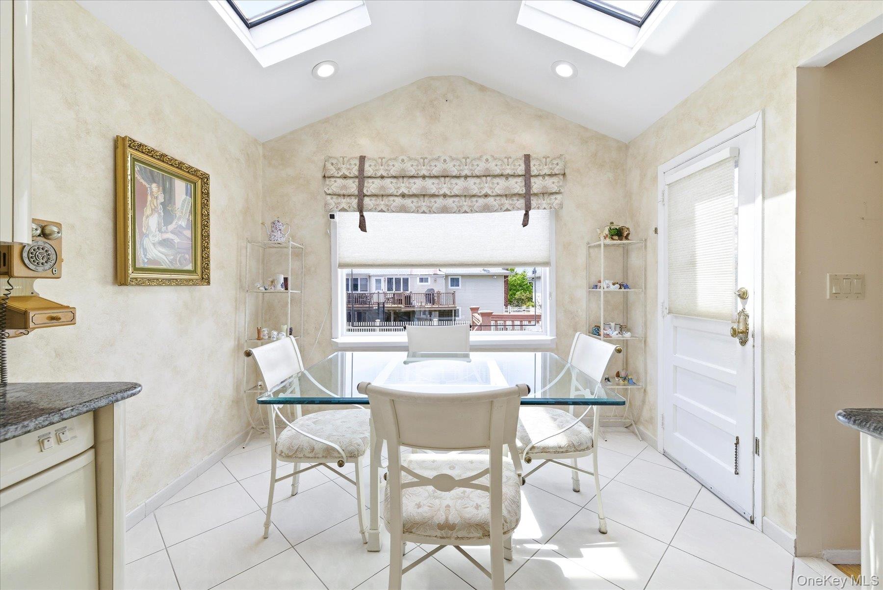 3284 Shore Road Oceanside, NY 11572 - Photo 9 of 27 a view of a dining room with furniture