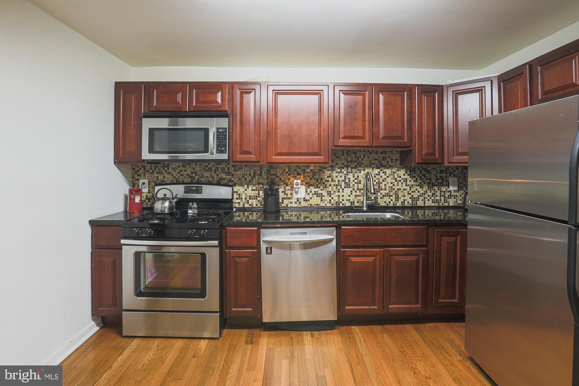 1228 East Eager Street Baltimore, MD 21202 - Photo 11 of 31 Gourmet Kitchen with Granite, Stainless and tiled