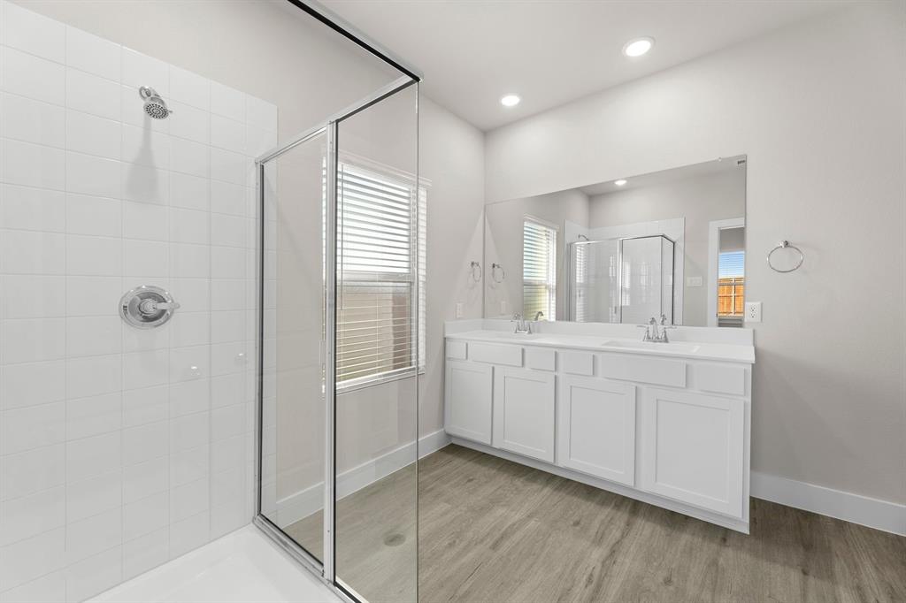 2372 Bell Way Forney, TX 75126 - Photo 16 of 39 a bathroom with a shower and a sink