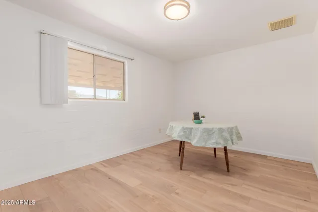 a workspace with furniture and window