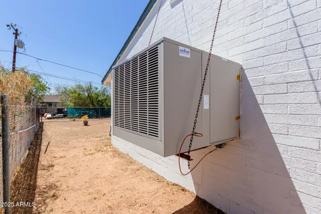 a view of a backyard with sitting area