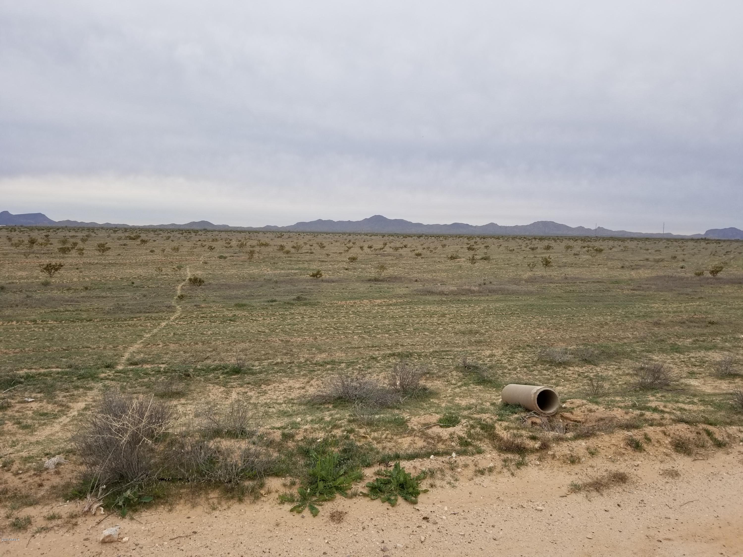531-xx-a West Elliot Road, Unit A Tonopah, AZ 85354 - Photo 16 of 25 a view of an ocean beach and mountain