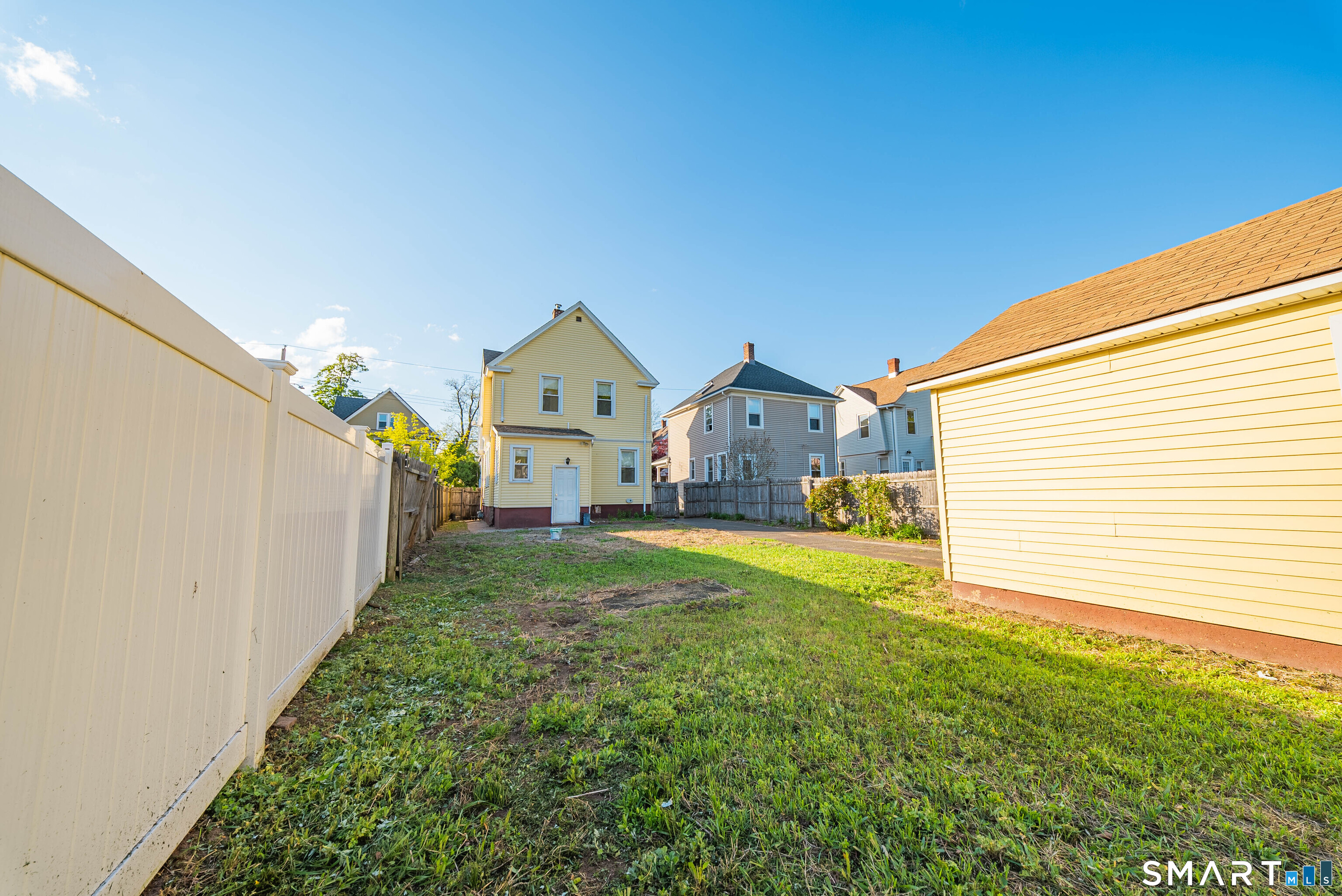 50 Jones Street West Haven, CT 06516 - Photo 19 of 21 a view of house with backyard