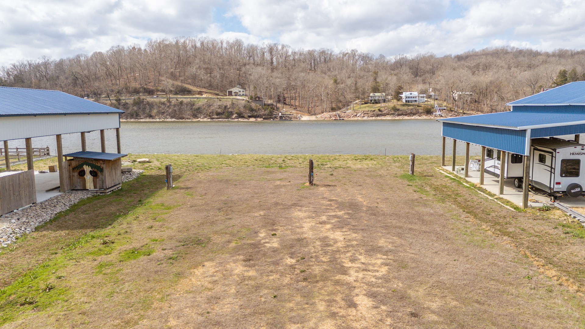 1987 Hardin Bottom River Road Clifton, TN 38425 - Photo 18 of 18 a view of a lake with houses in the back