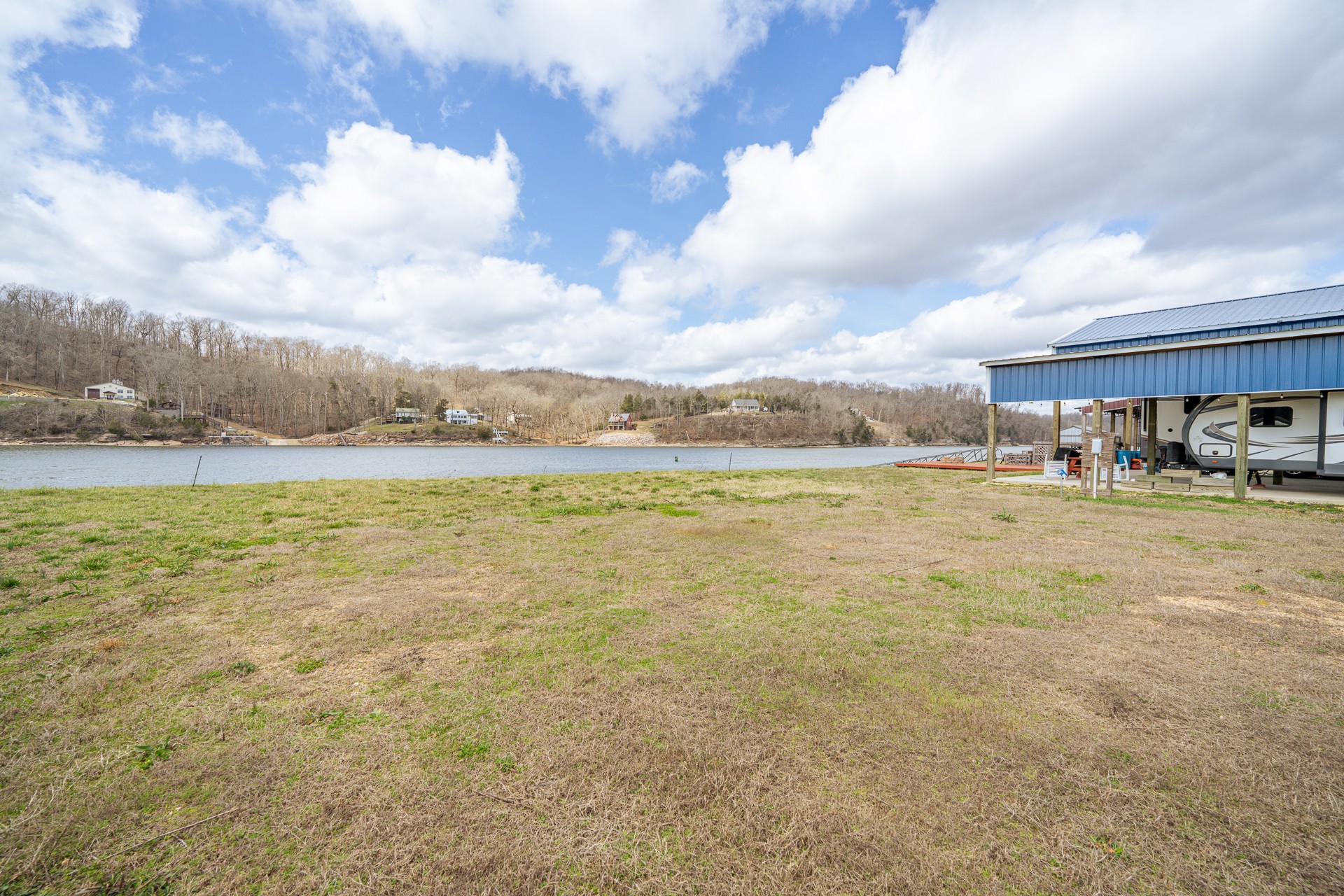 1987 Hardin Bottom River Road Clifton, TN 38425 - Photo 3 of 18 a view of a lake with houses