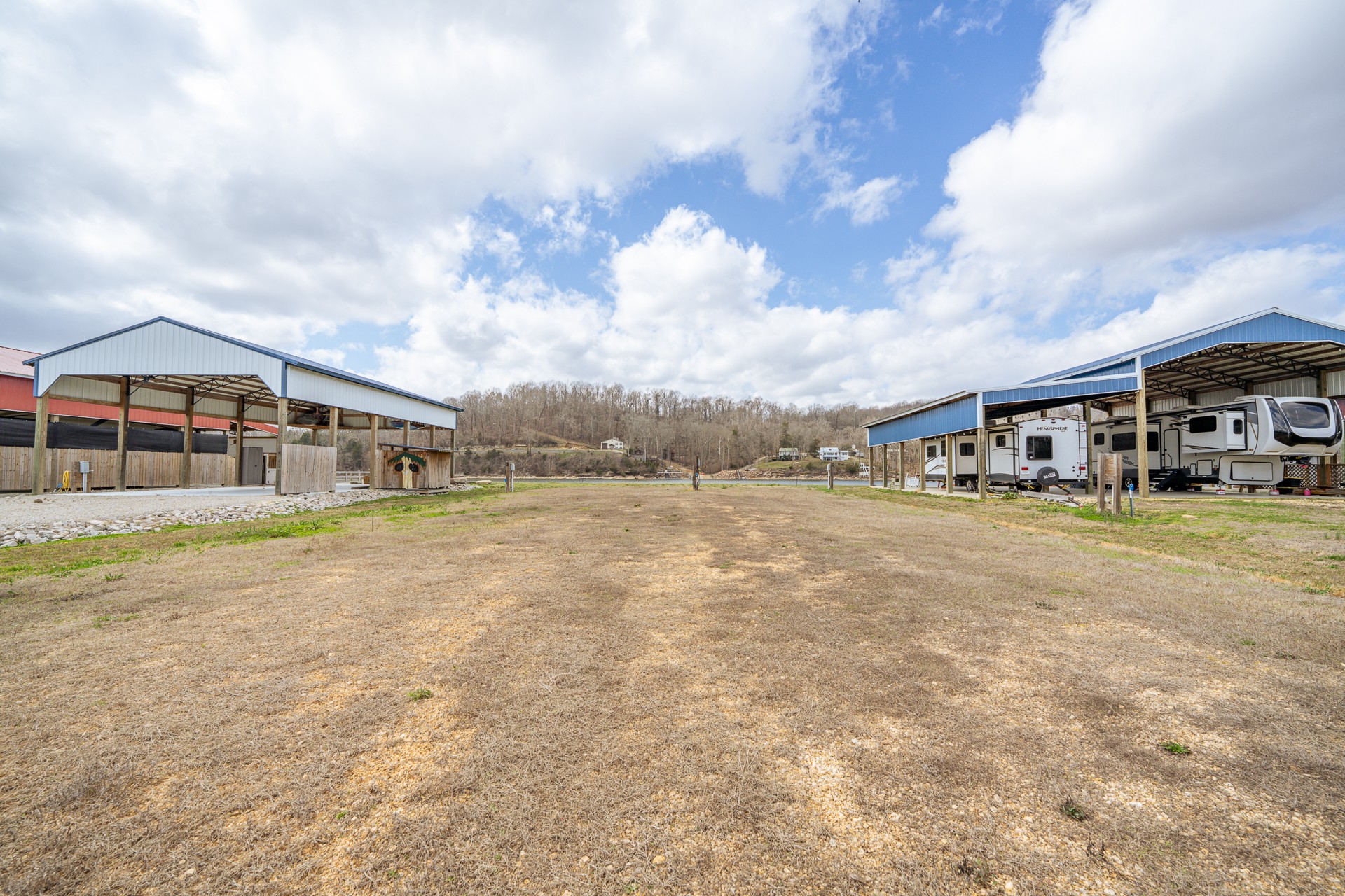 1987 Hardin Bottom River Road Clifton, TN 38425 - Photo 7 of 18 a view of swimming pool in front of residential houses