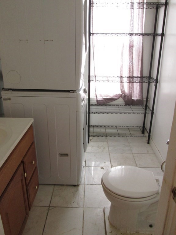 7-9 Reed Street Cambridge, MA 02140 - Photo 13 of 41 a bathroom with a toilet a sink and a shower