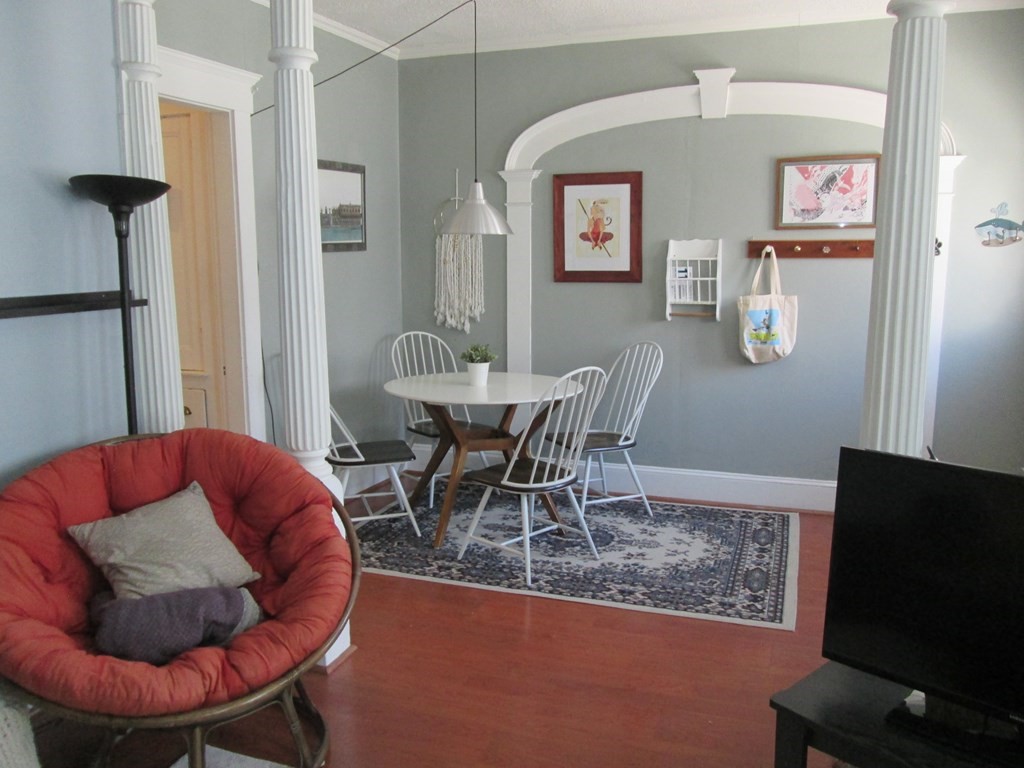 7-9 Reed Street Cambridge, MA 02140 - Photo 36 of 41 a dining room with furniture and wooden floor