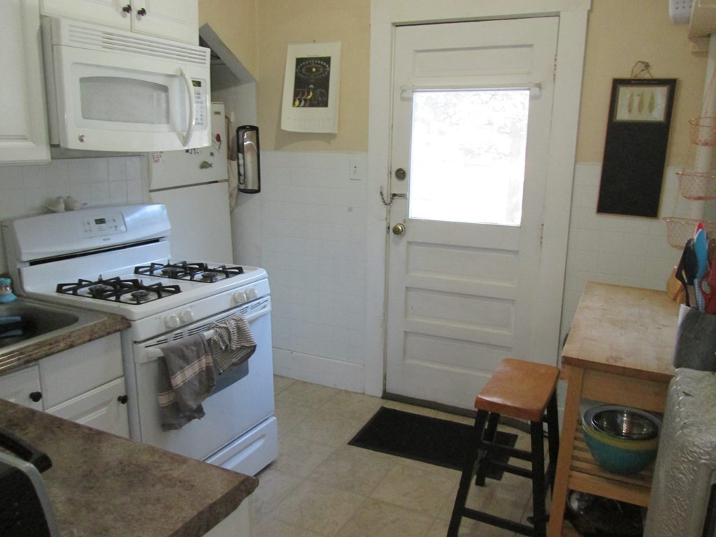 7-9 Reed Street Cambridge, MA 02140 - Photo 39 of 41 a kitchen with a stove and a cabinet