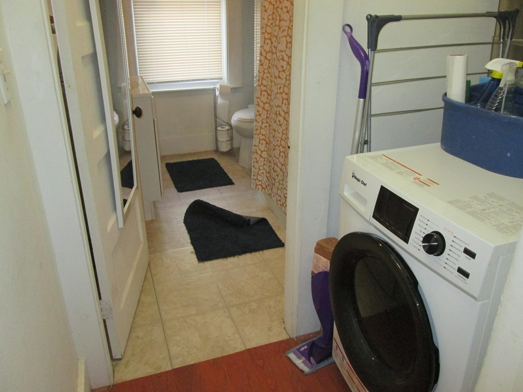 7-9 Reed Street Cambridge, MA 02140 - Photo 41 of 41 a utility room with dryer and washer