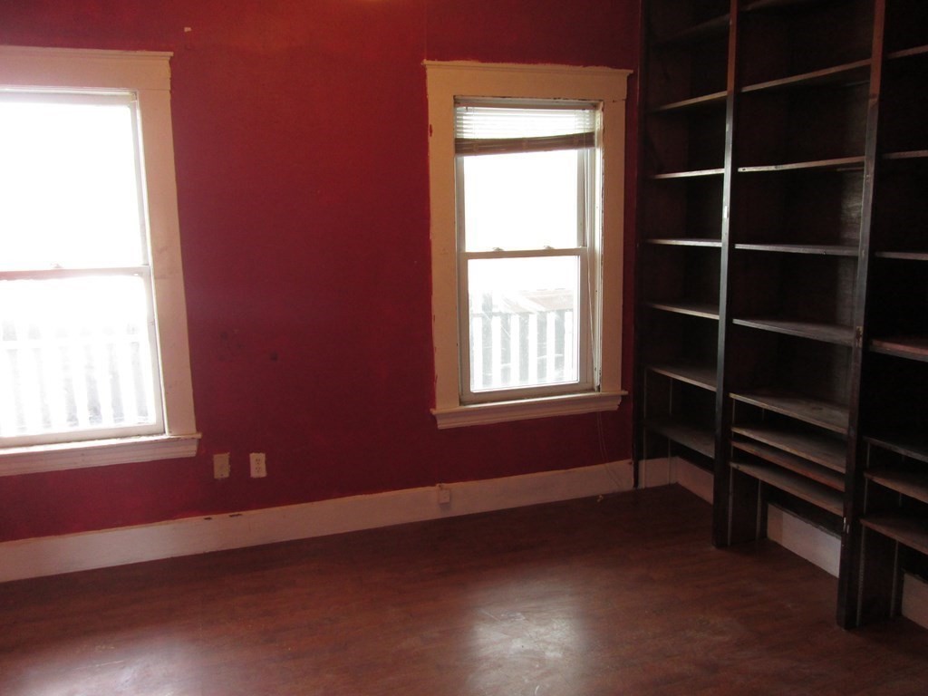 7-9 Reed Street Cambridge, MA 02140 - Photo 9 of 41 a view of an empty room with a window