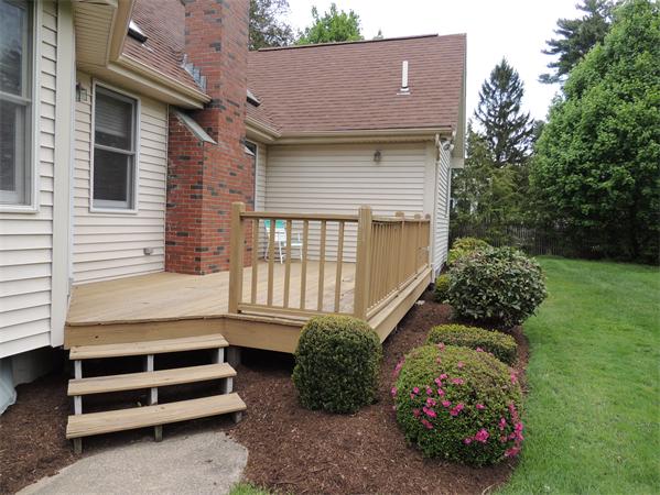 5 Chapelgate Road Canton, MA 02021 - Photo 18 of 20 a backyard of a house with lots of green space
