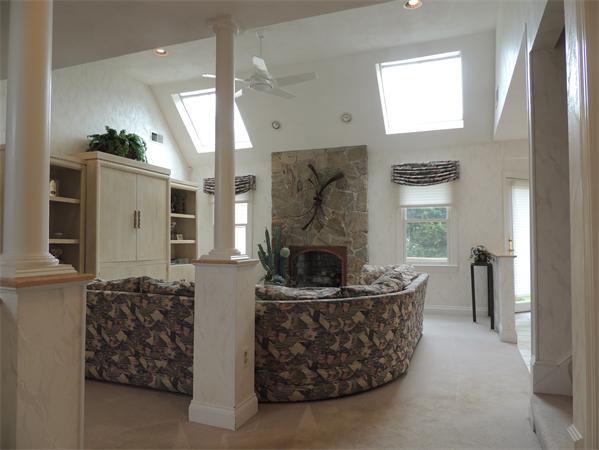 5 Chapelgate Road Canton, MA 02021 - Photo 2 of 20 a living room with furniture and a fireplace