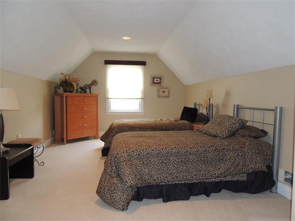 5 Chapelgate Road Canton, MA 02021 - Photo 10 of 20 a bedroom with a bed and a window