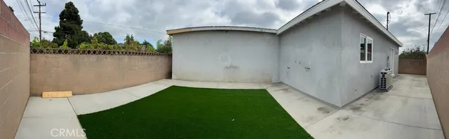 a view of yard from a corridor