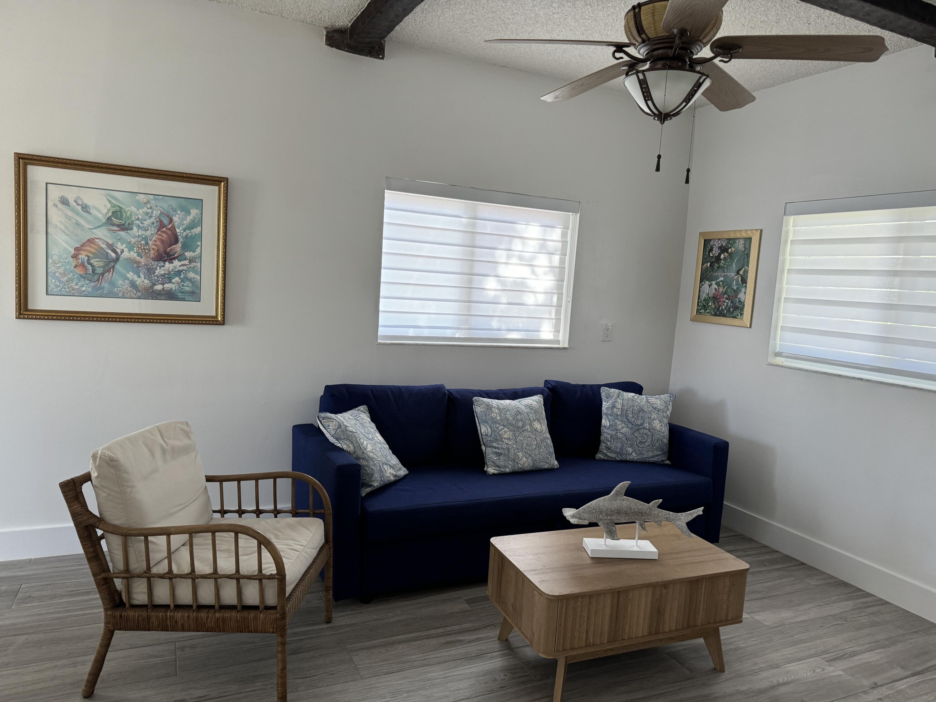 176 Lorelane Place Key Largo, FL 33037 - Photo 16 of 20 a living room with furniture and a window