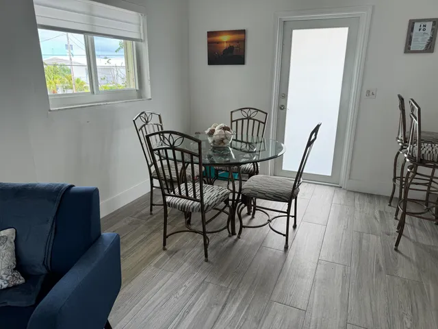a kitchen with a sink cabinets and appliances