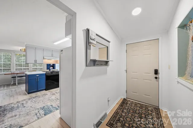 a bathroom with a tub shower and sink