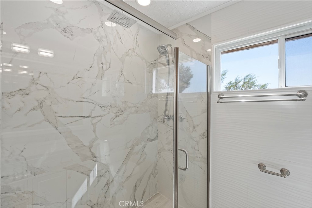 23859 S Road Apple Valley, CA 92307 - Photo 21 of 45 a bathroom with a shower