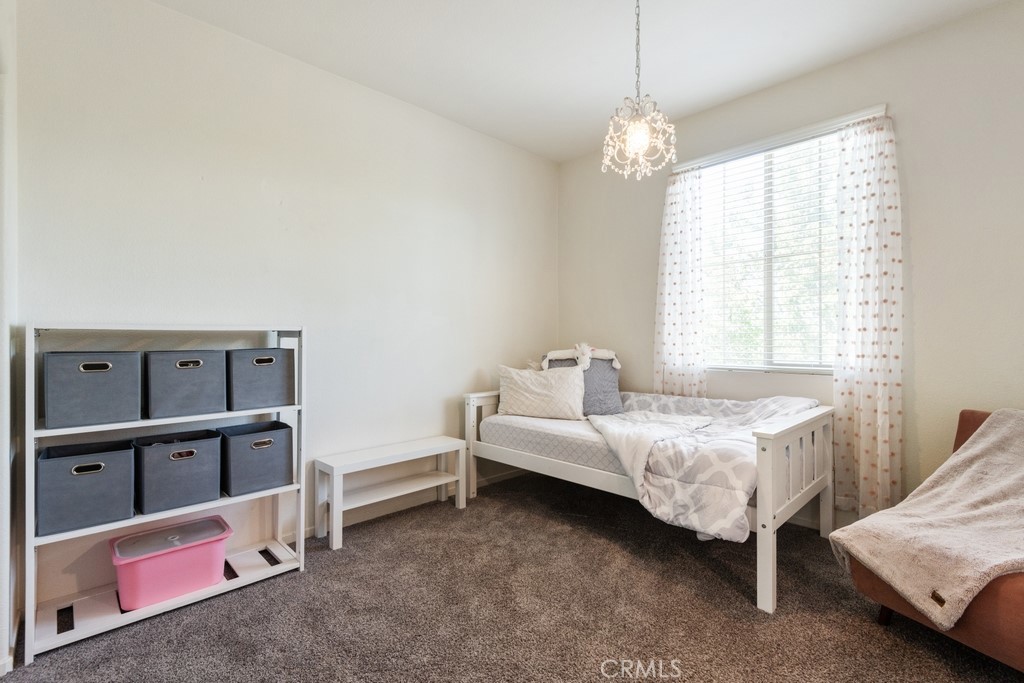 29463 Bouris Drive Menifee, CA 92584 - Photo 11 of 26 a bed room with a bed and a window