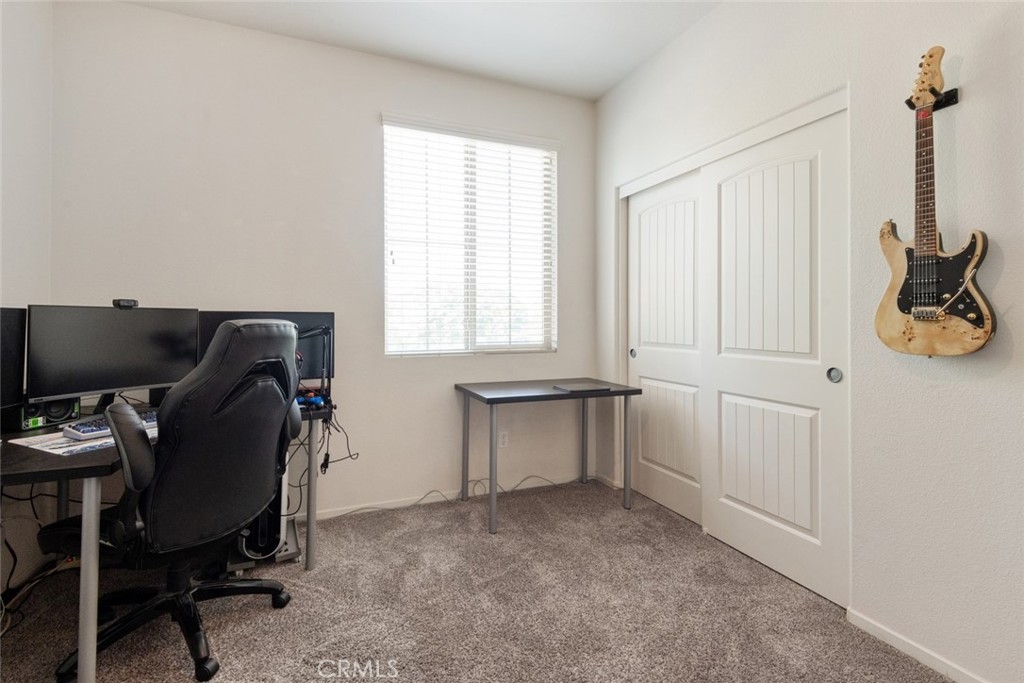 29463 Bouris Drive Menifee, CA 92584 - Photo 13 of 26 a workspace with furniture and a window
