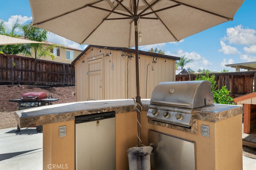 29463 Bouris Drive Menifee, CA 92584 - Photo 19 of 26 a close up of a sink a washer and dryer