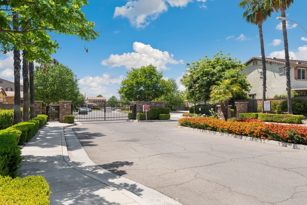 29463 Bouris Drive Menifee, CA 92584 - Photo 20 of 26 a view of a street with palm trees