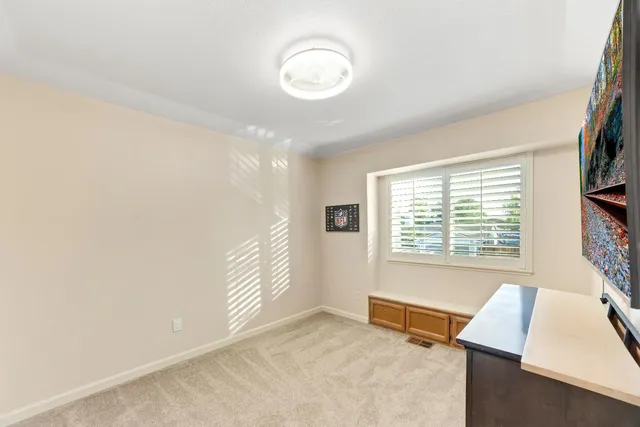 a front view of a house with swimming pool