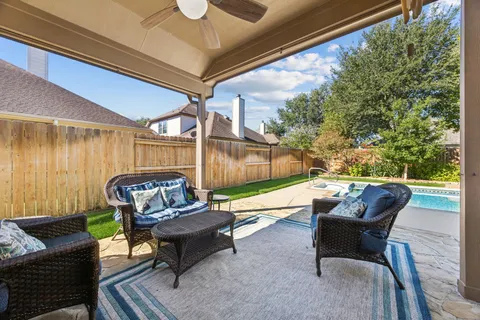 a outdoor living space with furniture and a couch